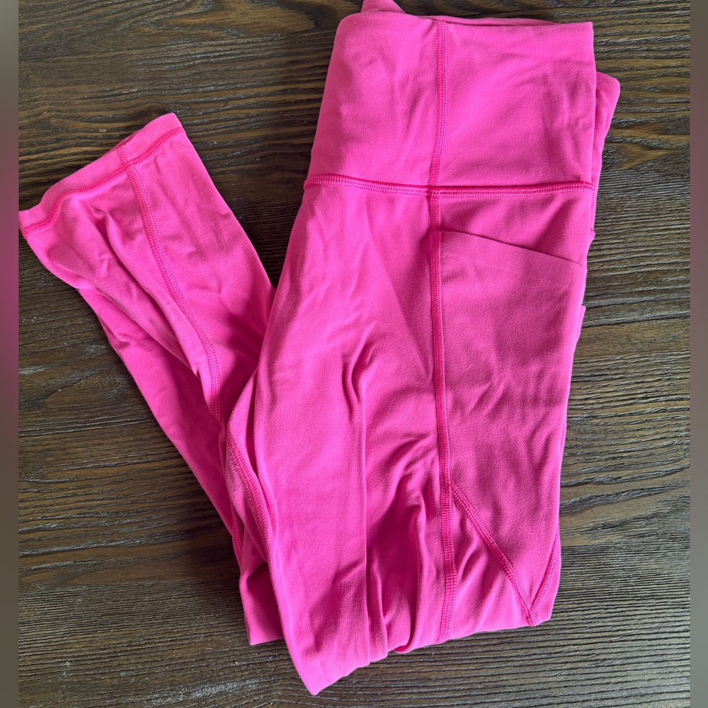 Athleta pink workout leggings with pockets